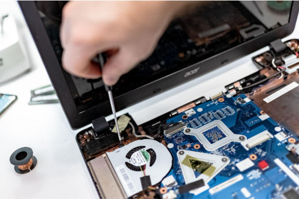 Home 25 Computer Being Repaired